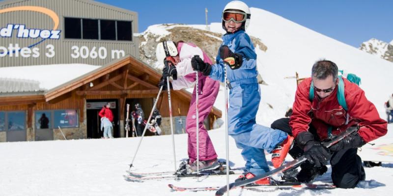 Getting ready to ski, Alpe d'Huez. Getting ready to ski, Alpe d'Huez.© Laurent Salino, Alpe d'Huez Tourism