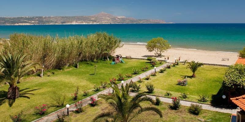 GK Beach Hotel gardens and beach.