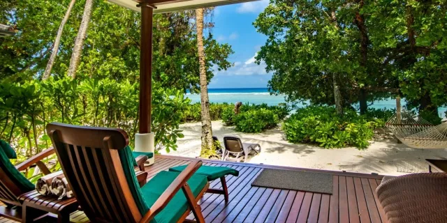 Relax in your own villa, right on the beach.