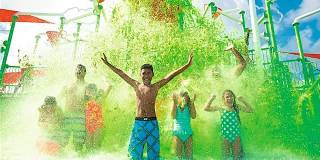 Family enjoying the waterpark at Nickelodeon Hotels & Resorts Punta Cana